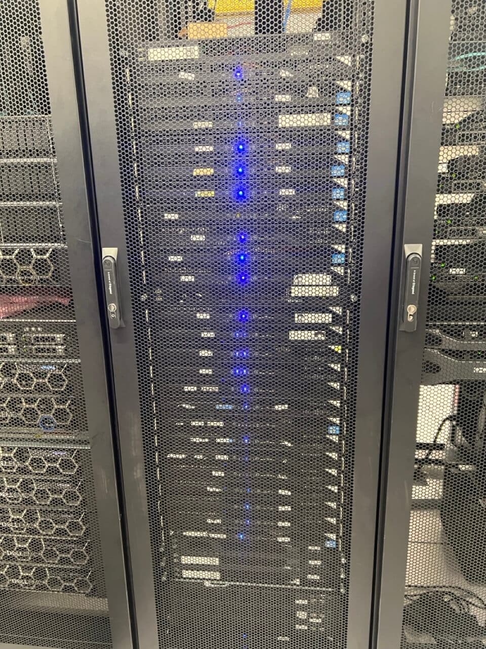 High-performance server rack with active LED indicators powering reliable web hosting services