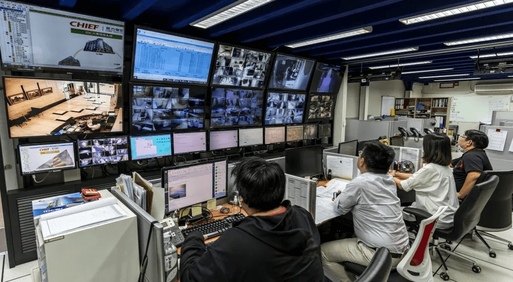A few staffs working and monitoring in the data center of TW01 @ Taipei