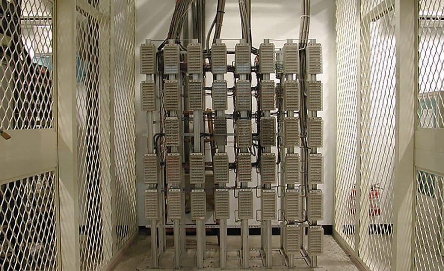 Telecom distribution frame with metal enclosures for cable termination in data center