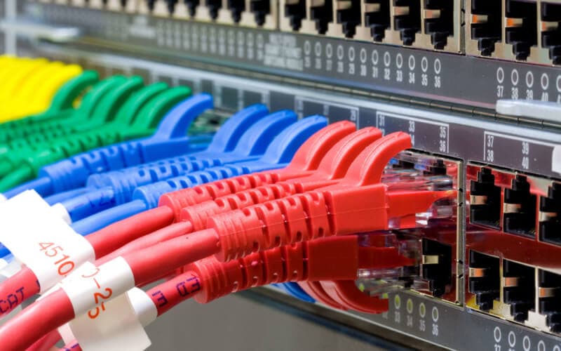 Network cables plugged into a switch Network cables plugged into a switch