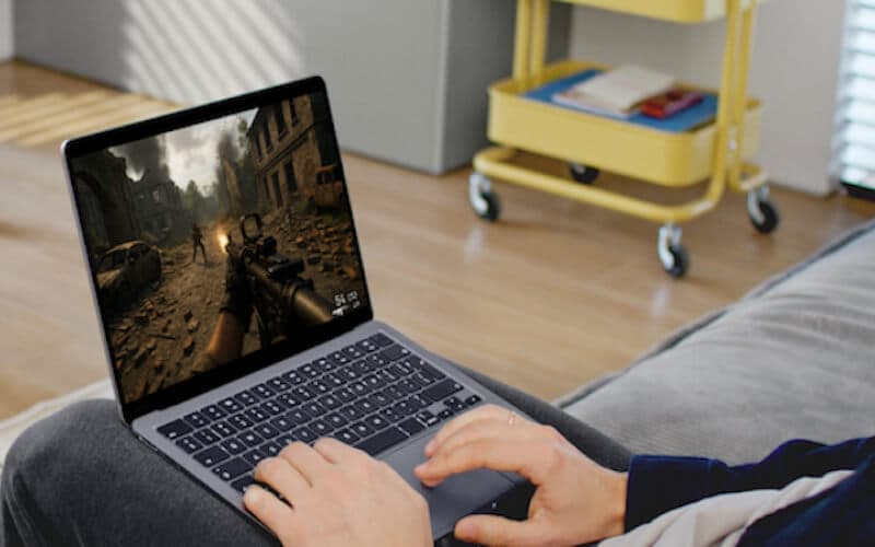 A person seated on a couch using a laptop, symbolizing game server hosting for multiplayer titles with customizable settings. A person seated on a couch using a laptop, symbolizing game server hosting for multiplayer titles with customizable settings.