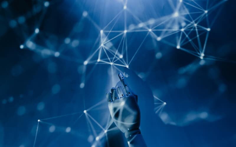 A hand touching a virtual network interface with interconnected nodes, representing self-hosted business tools and automation solutions. A hand touching a virtual network interface with interconnected nodes, representing self-hosted business tools and automation solutions.