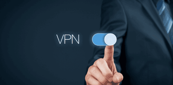 A person in a suit touches a digital toggle switch labeled 'VPN', set to 'on'. The image conveys a sense of security and technology. A person in a suit touches a digital toggle switch labeled 'VPN', set to 'on'. The image conveys a sense of security and technology.